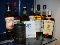 Two bottles of the Famous Grouse (700ml), a bottle Southern Comfort (1 ltr), a Jack Daniels Tennesse