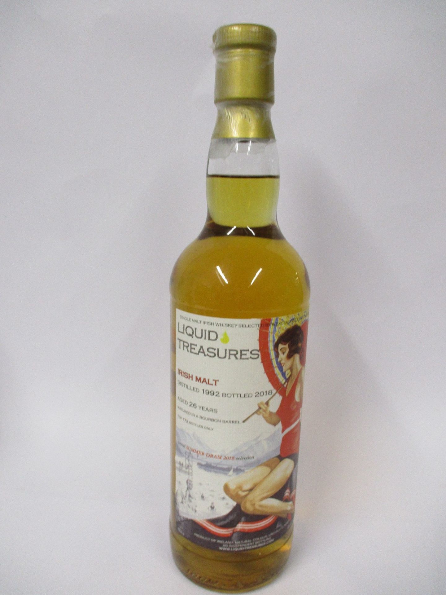 A bottle of Liquid Treasures Irish single malt whiskey (Aged 26 years) (700ml) (Over 18s only).