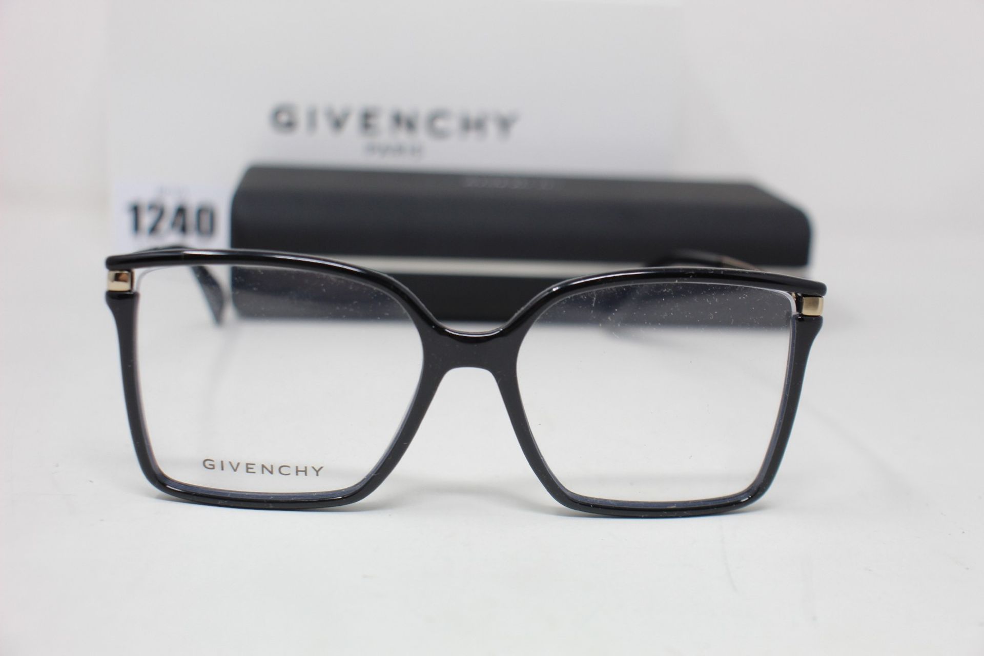 A pair of as new Givenchy glasses frames.