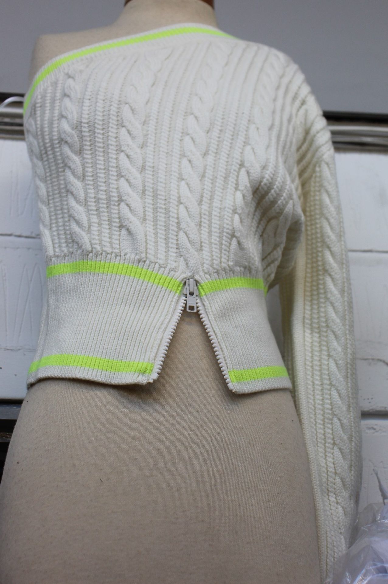 An as new David Koma one shoulder cable knit jumper (L - RRP £241).