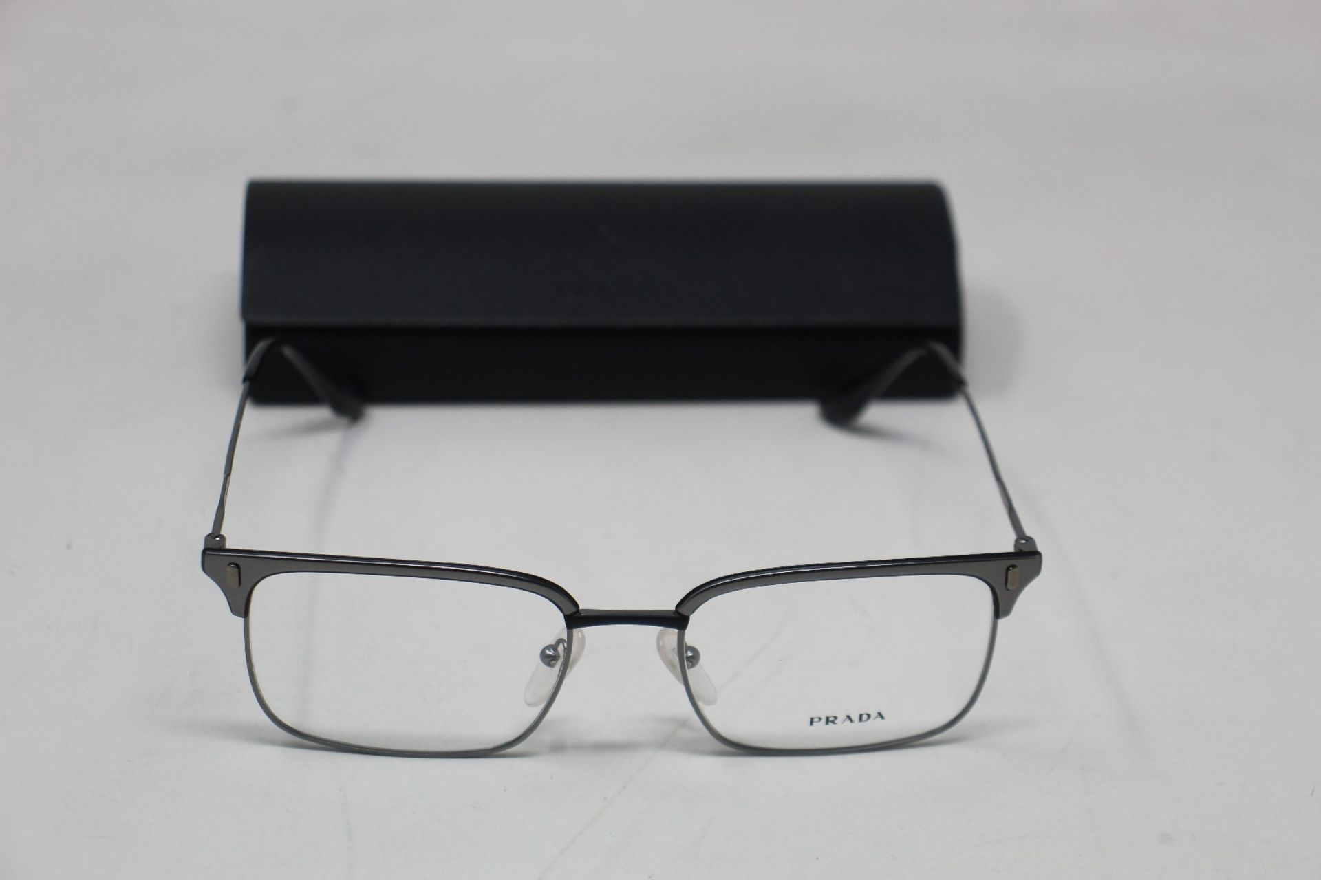 A pair of as new Prada glasses frames.