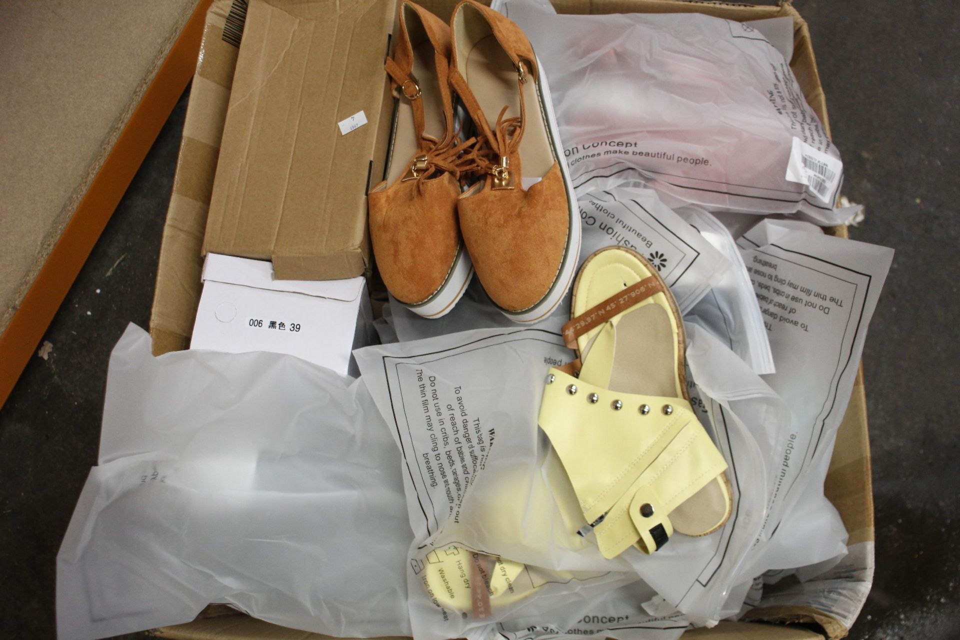 A box of assorted fashion shoes, various styles and sizes.