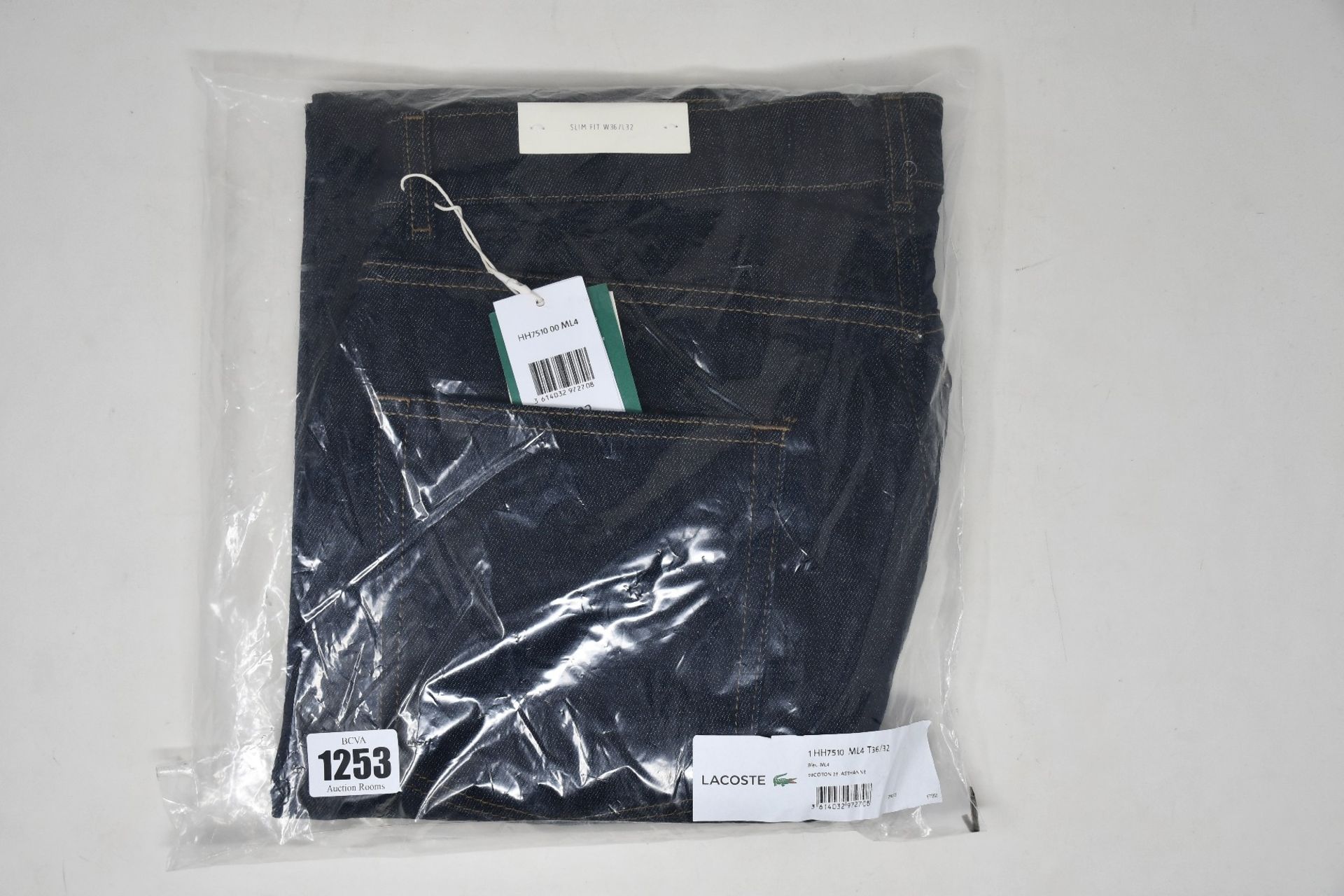 A pair of as new Lacoste jeans (W36/L32).
