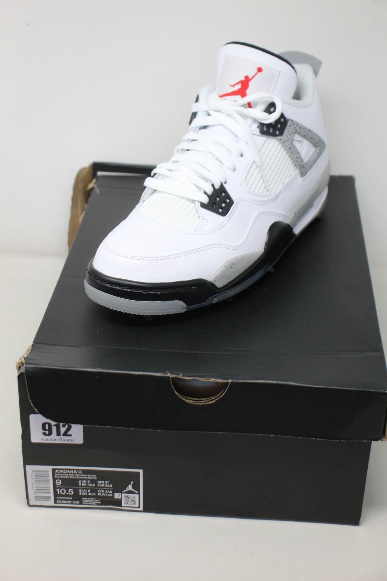 A pair of as new Nike Jordan IV G (UK 8).