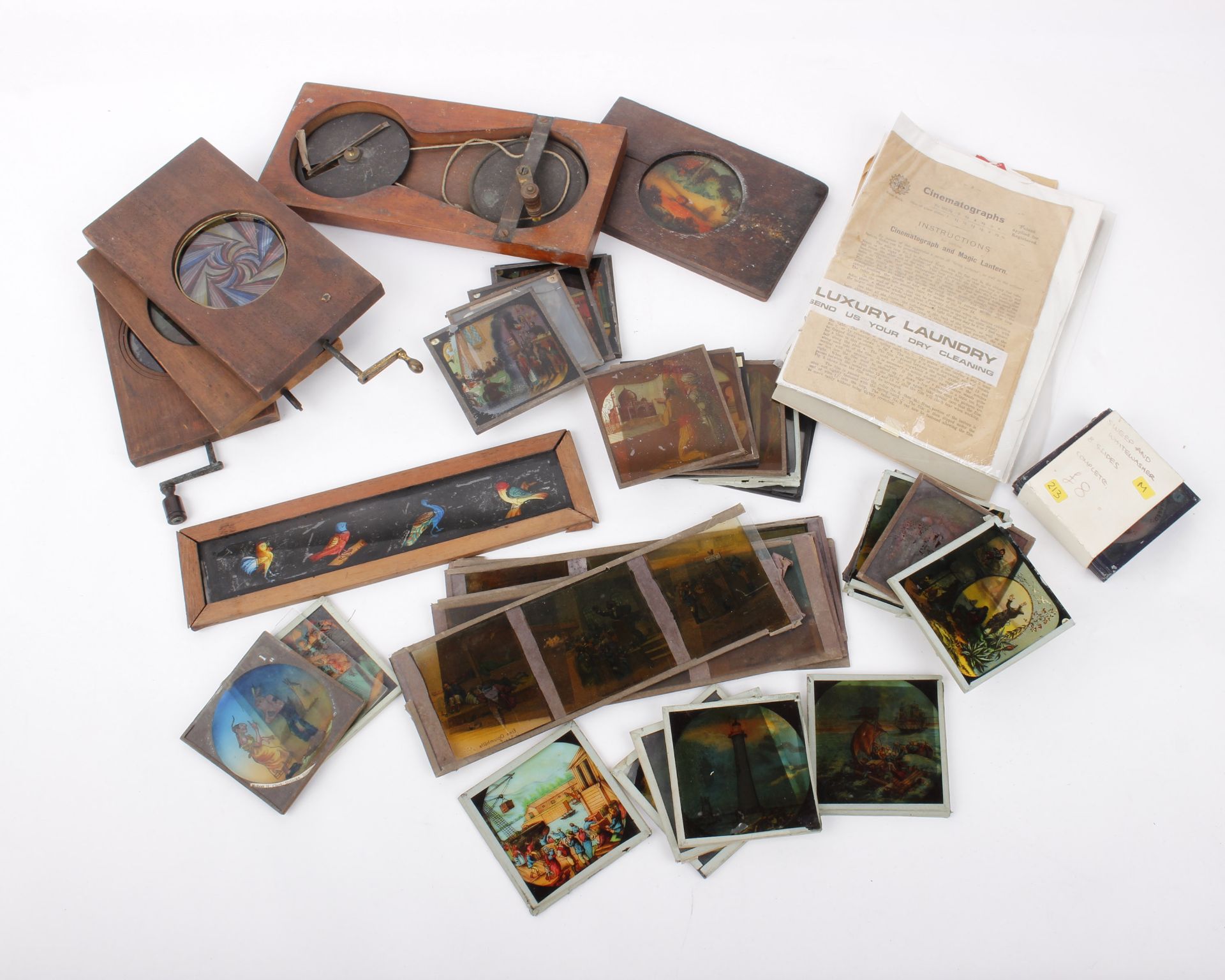 A collection of 17/18th century photographic Magic Lantern slides - hand painted on glass -