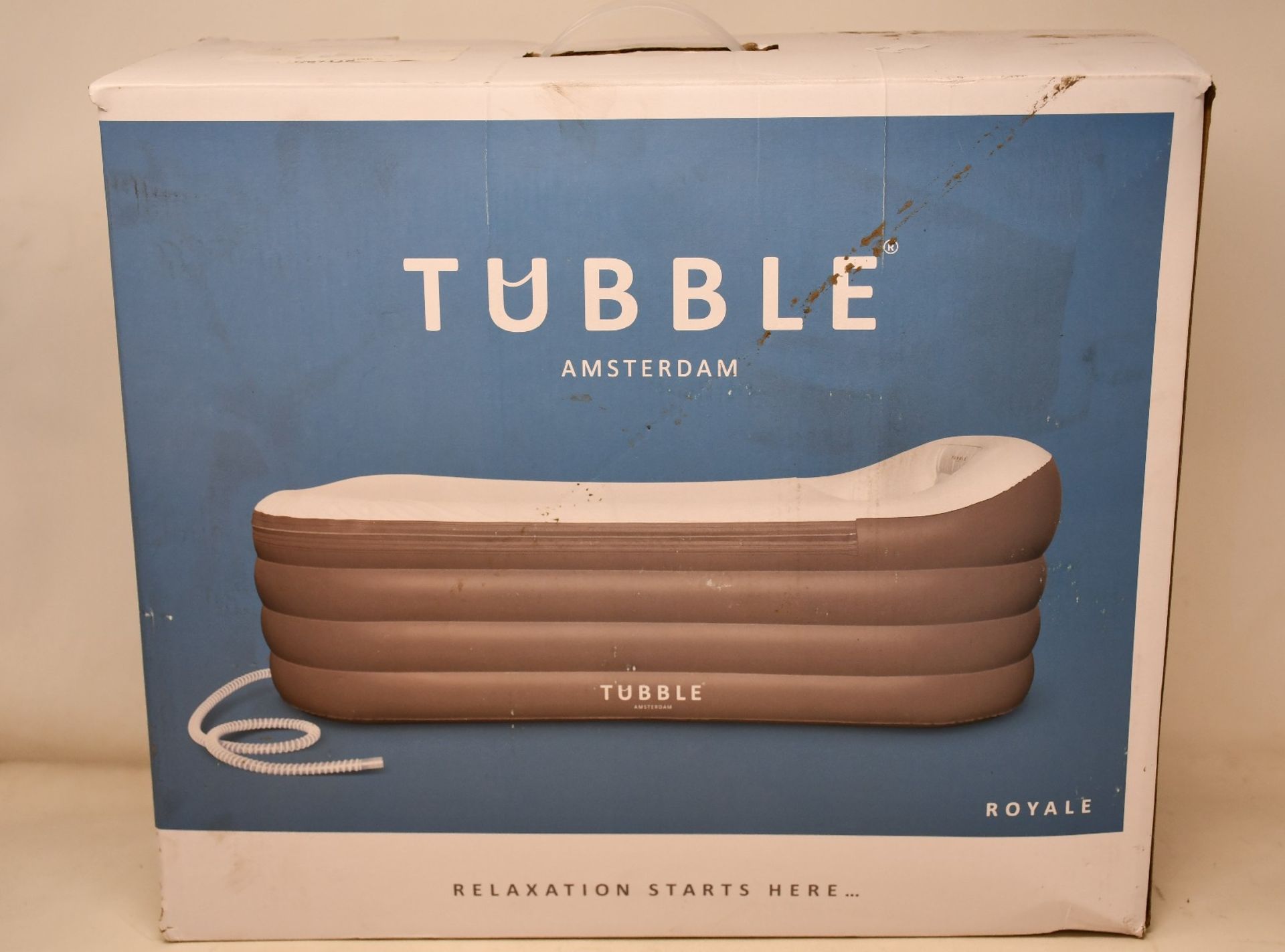 A boxed as new Tubble Royale inflatable bathtub.