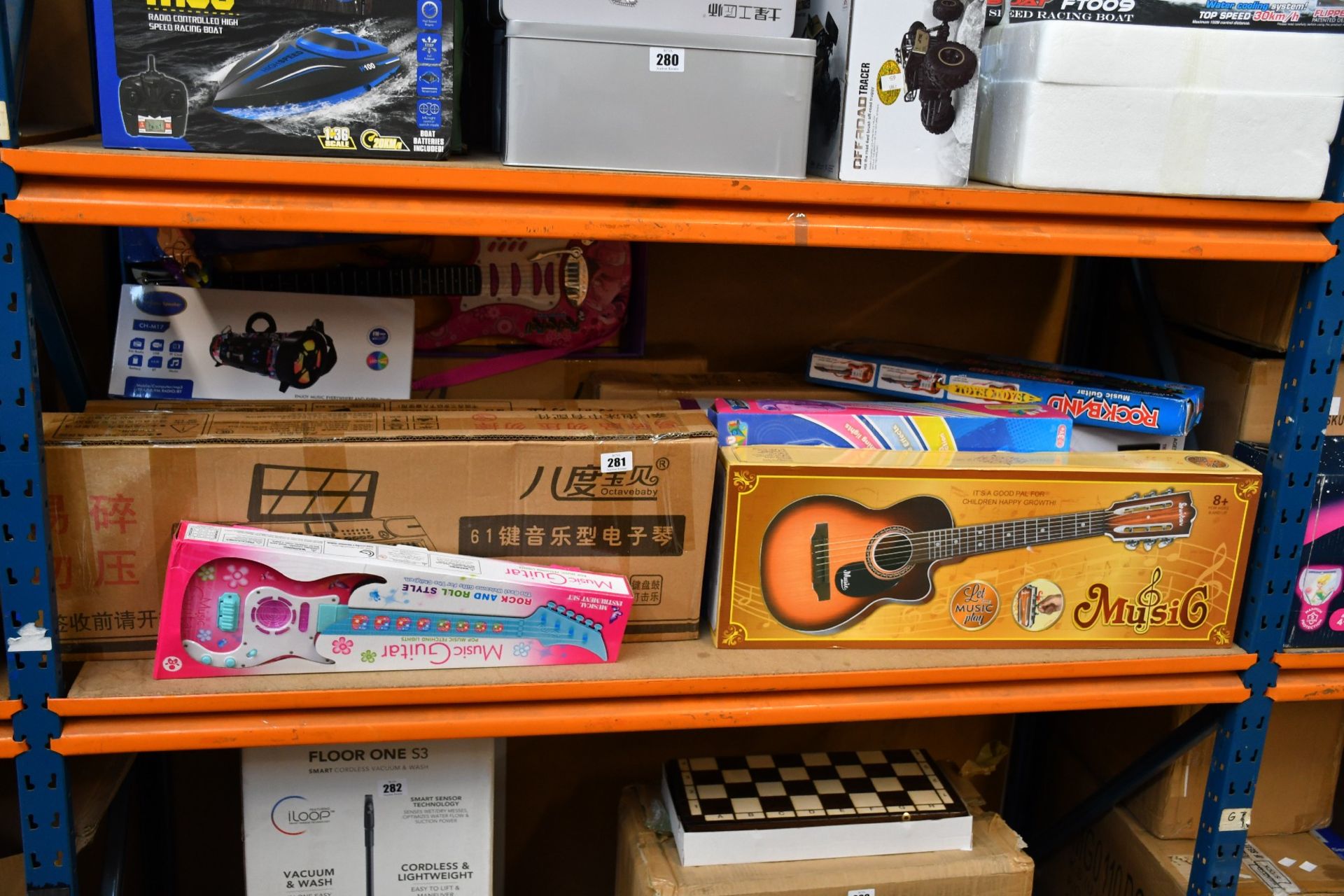 A quantity of children's assorted musical instruments to include keyboards, guitars, speaker and