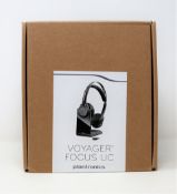 A boxed as new Plantronics Voyager Focus UC B825 headset in black.