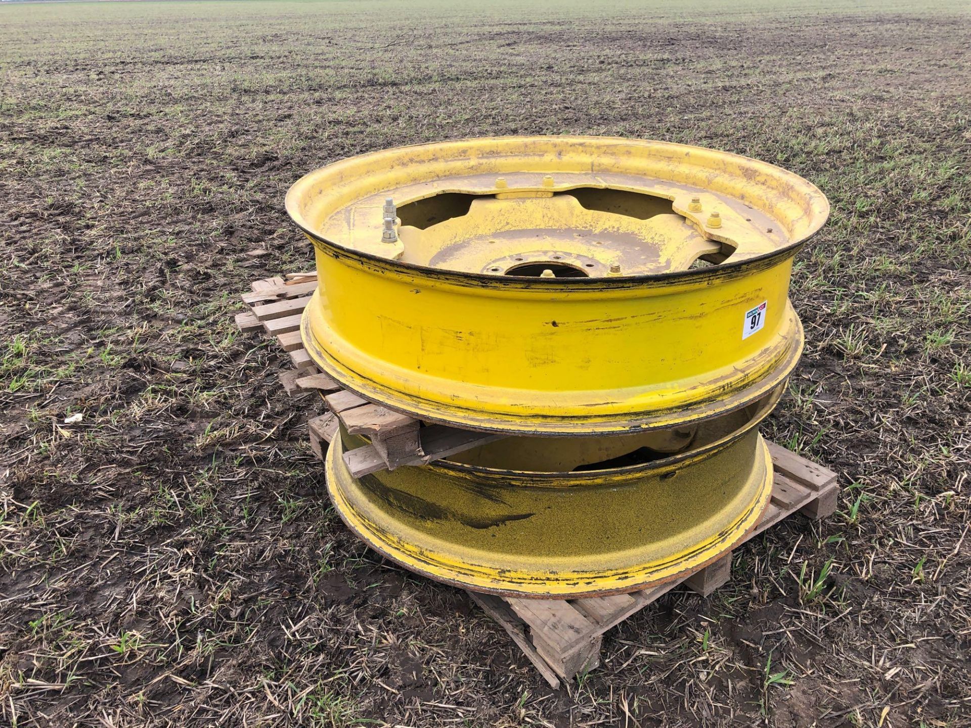 Pair of rear John Deere rims