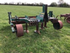 1993 Cousins V-form 5 leg subsoiler with rear crumbler and depth wheels. Serial No: VF22M3CB18