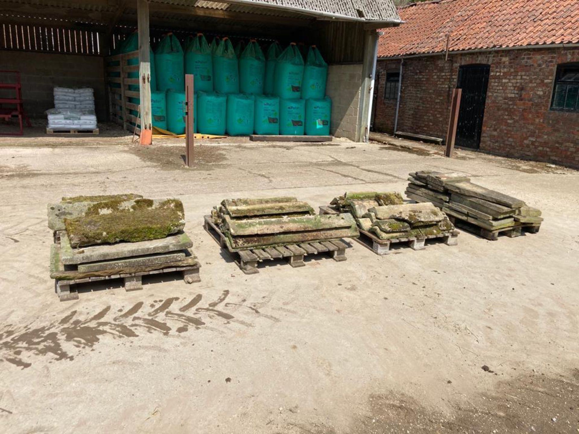 4 pallets of assorted stone capping and flags