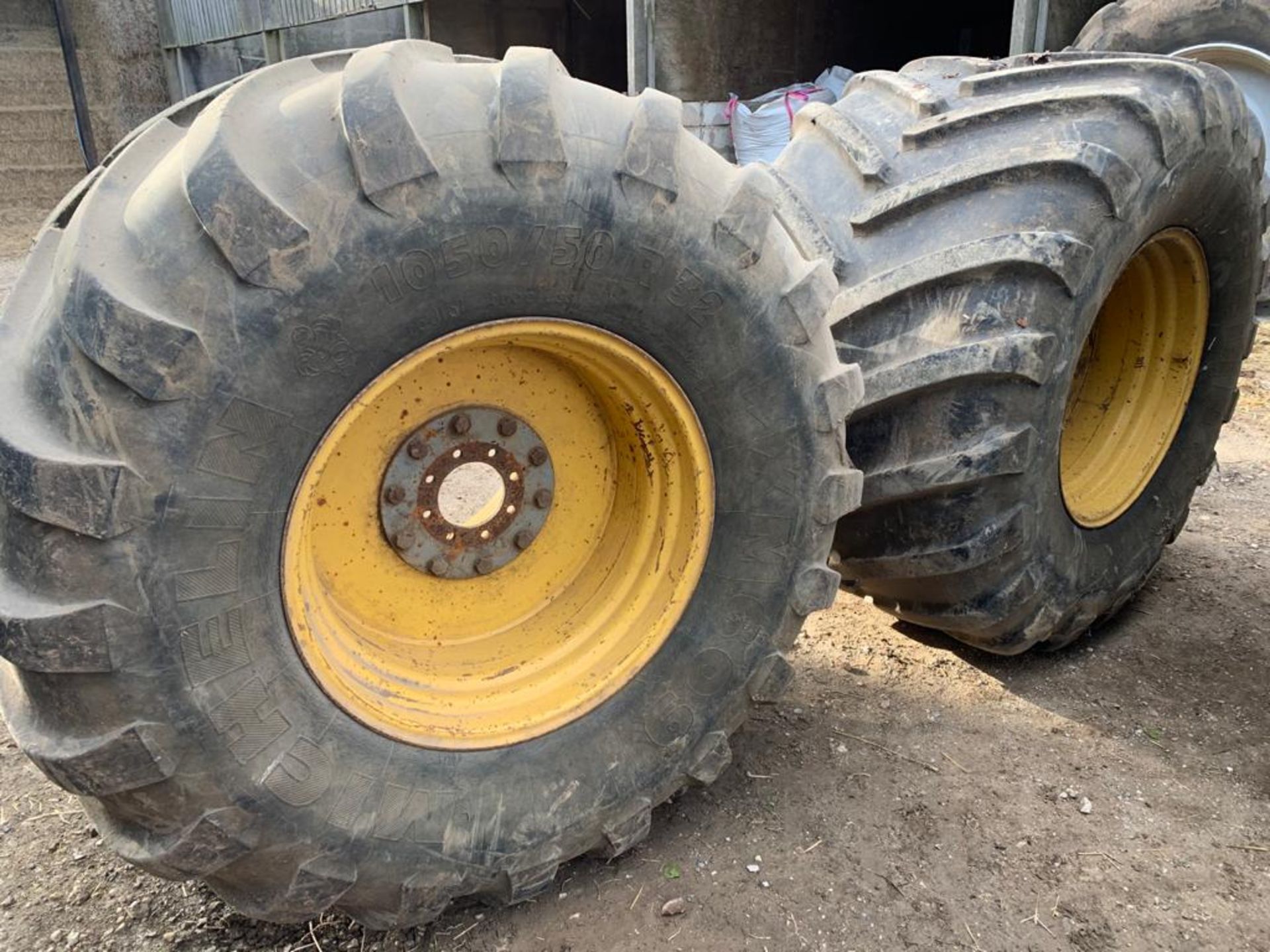Pair of wheels on 1050/50R32 Michelin tyres.