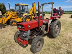 Massey Ferguson 135 2wd tractor with roll bar on 205R16 front and 12.4-28 rear wheels and tyres, die