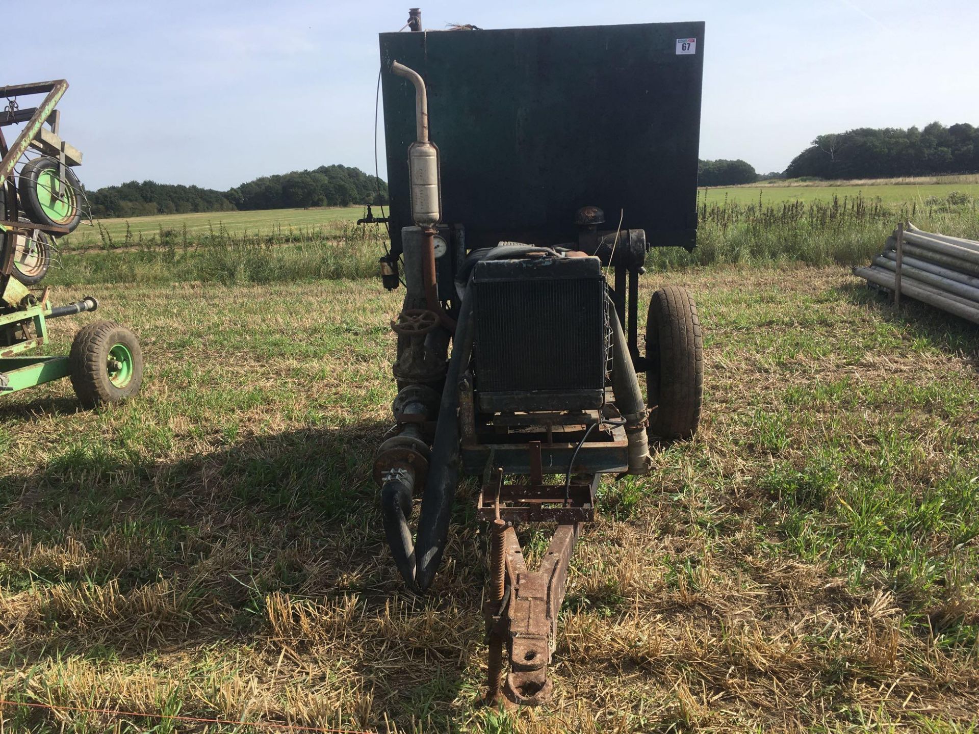 Irrigation pump on transport frame with mounted diesel tank.