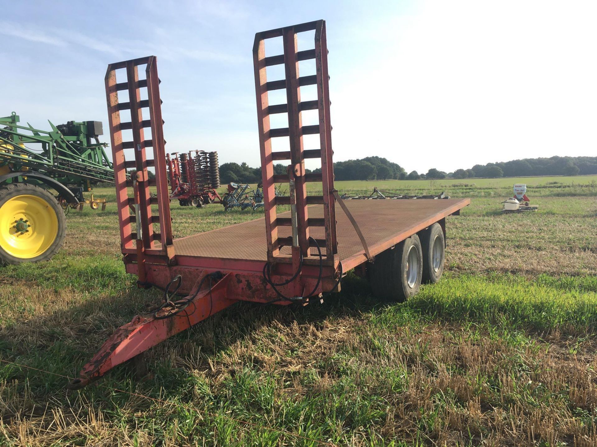 15ft twin axle plant trailer with hydraulic ramps.