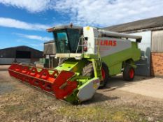 1997 Claas Lexion 450 combine with C660 (22ft) auto contour header and header trolley. 6 straw walke