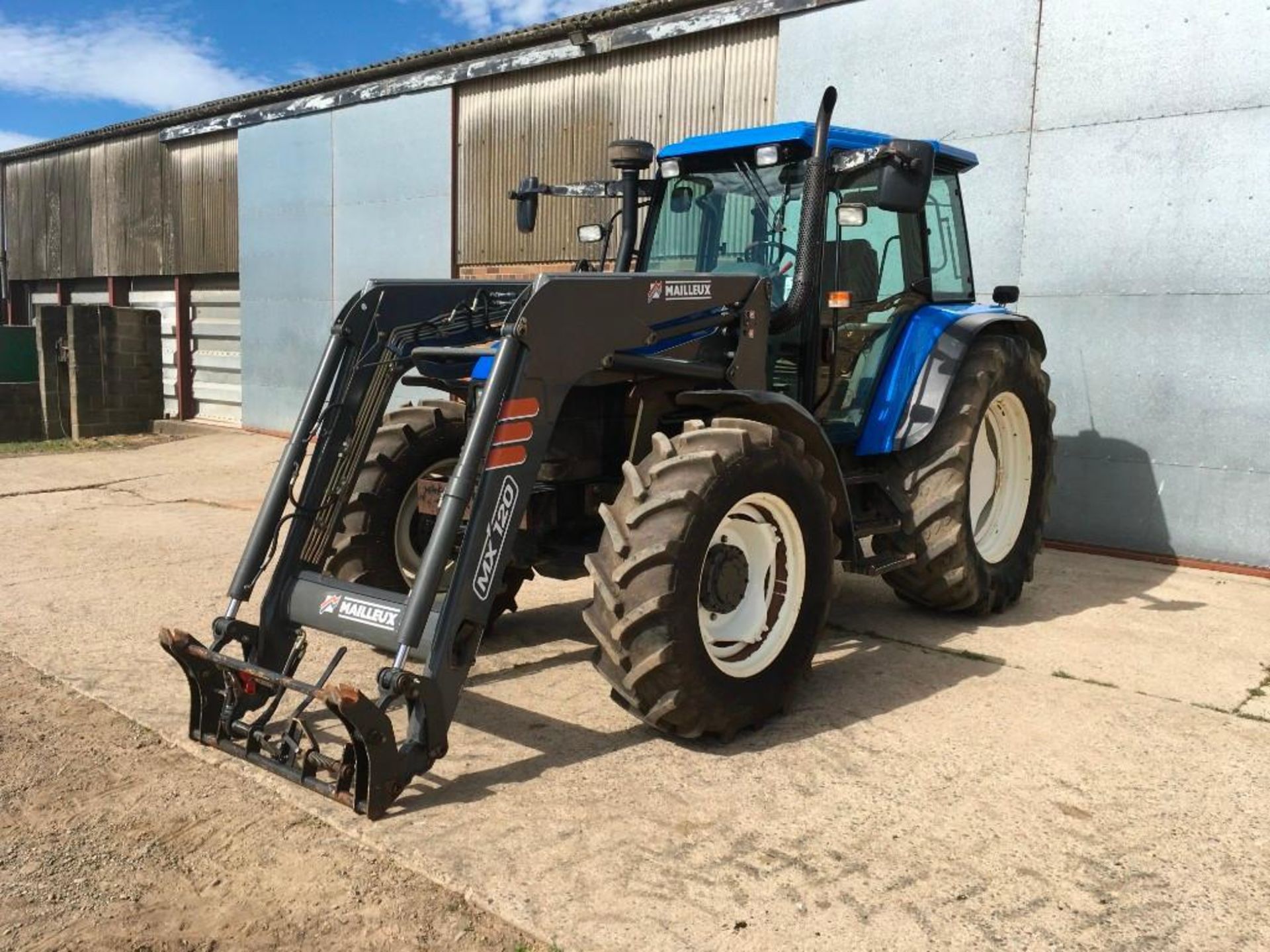 2003 New Holland TS115 tractor with Mailleux MX120 front loader. 2 spool valves, rear link arms and