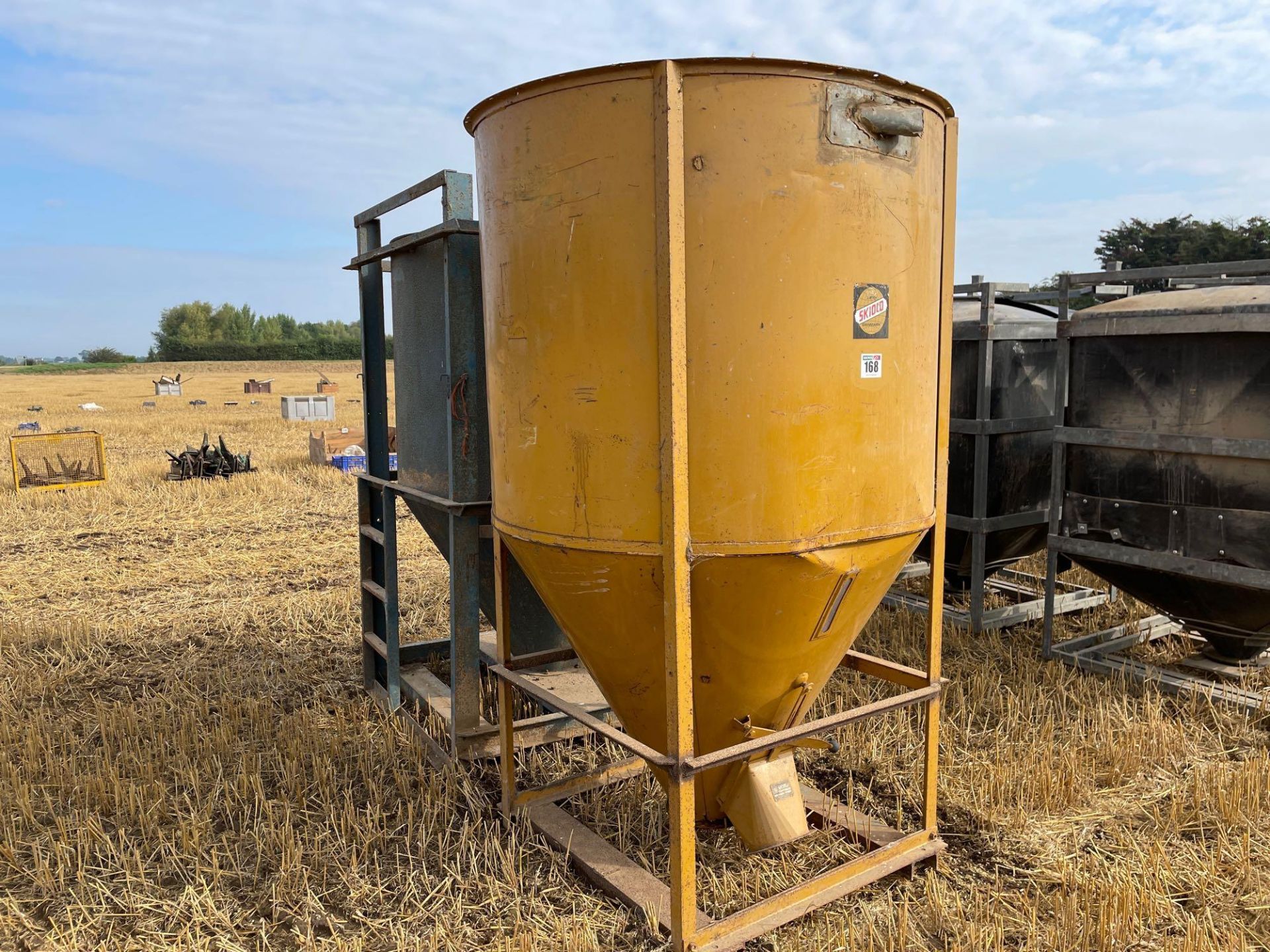 Pair metal grain tanks