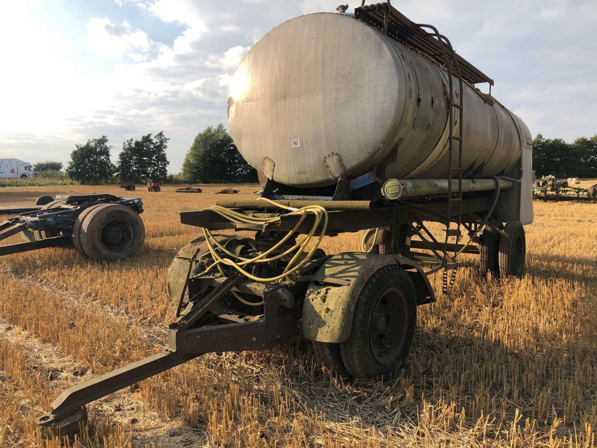 Stainless steel 4 wheel 10,000l tanker on Scammel carriage