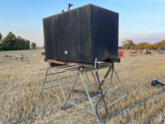 Metal tank on stand