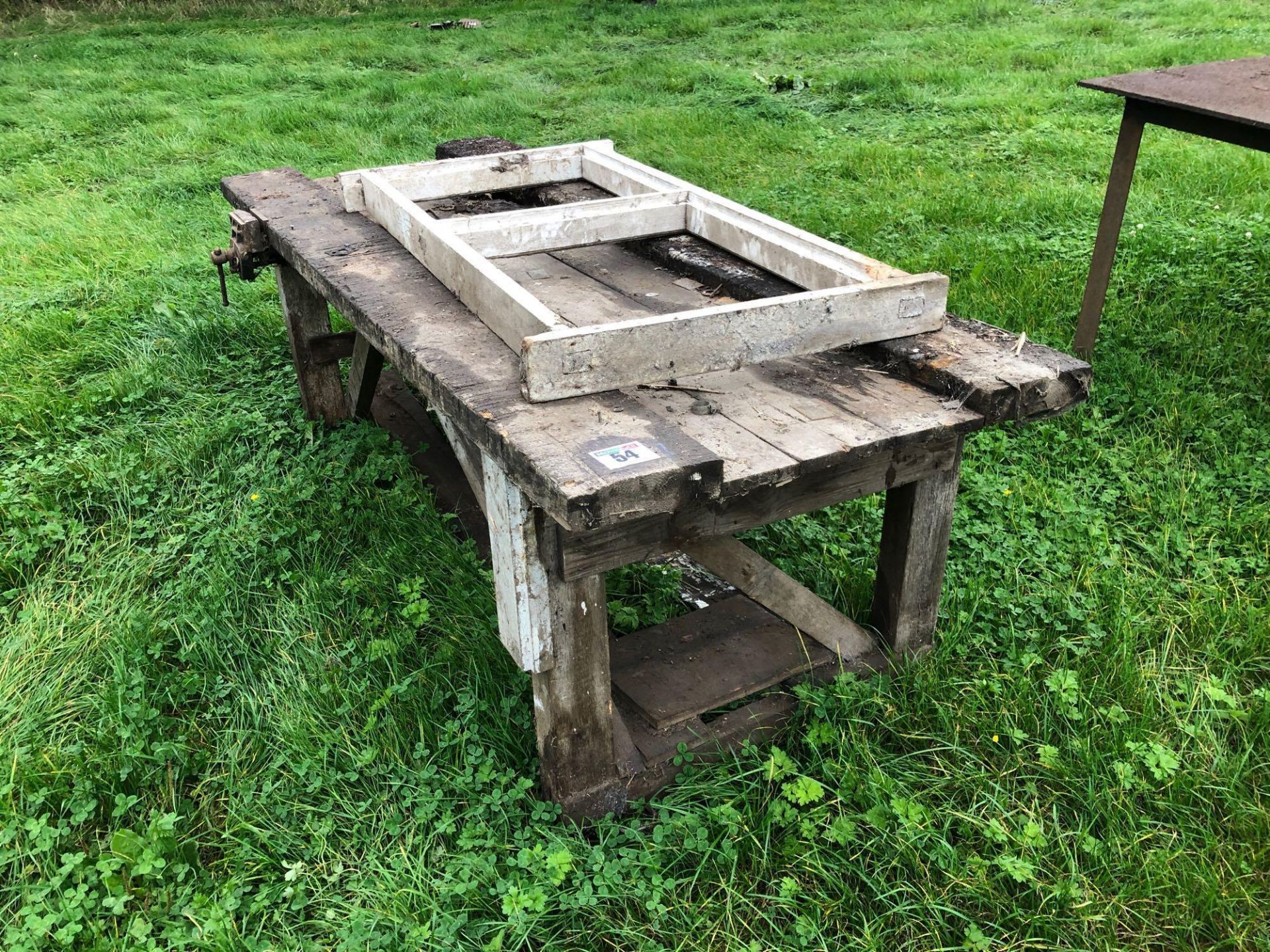 Wooden work bench with vice