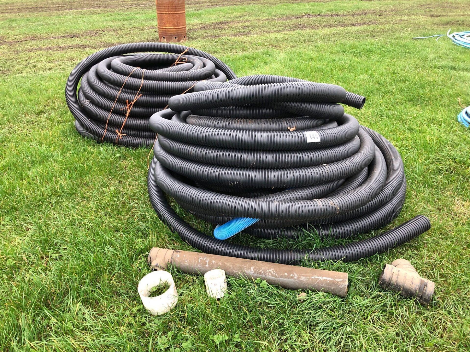 Quantity 4" perforated drainage pipe