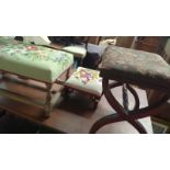 Three grospoint upholstered footstools, the largest 65cmW