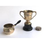 A small trophy cup by Joseph Gloster Ltd, Birmingham 1966, 10cm high; a small silver jug with turned