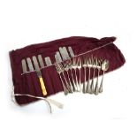 A set of French plated forks, together with a number of bone handled stainless steel knives, with