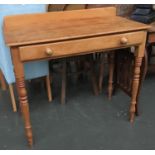 A small pine writing desk, with single drawer on turned legs, 91x45x76