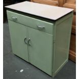 A 1950s green kitchen unit, formica top over single drawers and cupboard doors, 78x40x76cmH