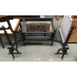 A substantial wrought iron fire grate, 105cmW