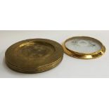 A set of 12 brass Liberty plates, stamped to base, 1ft in diameter; together with a cut glass cake