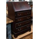 A modern hardwood bureau, fall front over four drawers, 60x43x99cmH