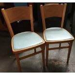 A pair of 1960s vinyl upholstered kitchen chairs