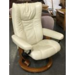 An Ekornes reclining chair, upholstered in vinyl