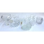 A mixed lot of cut glassware to include a set of four brandy balloons, trifle dishes, fruit bowls,