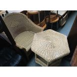A hexagonal wicker occasional table, 65x61cmH together with wicker armchair