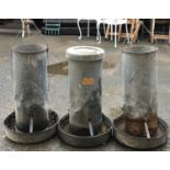 Three galvanised metal poultry feeders, marked Eltex, approx. 60cmH