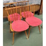 A set of four mid-century stickback kitchen chairs