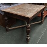 A 20th century oak kitchen table, turned legs and cross stretcher, 120x90x74cmH