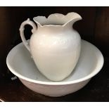A white ceramic washbowl and jug, marked J.H.W & Sons Falcona ware, the bowl 39cmD