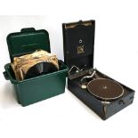 A HMV model 101 portable gramophone, with winding handle, together with a number of 78s
