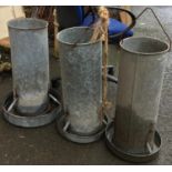 Three galvanised poultry feeders, approx. 60cmH