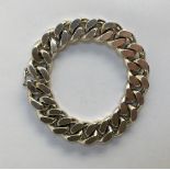 Heavy silver metal bracelet (no obvious hallmark) with hidden link clasp, approx 133g