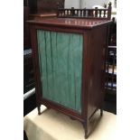 A mahogany glazed cabinet, opening to reveal two shelves, 59x39x105cmH