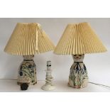 A pair of decorative table lamps in the form of seated cats, from the Knossos Pottery, Warminster,
