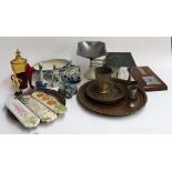 A mixed lot to include scales, Delft pottery, copper charger, glass urn, enamelled napkin rings etc