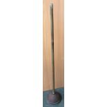 A copper laundry plunger