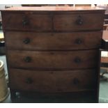 A 19th century mahogany bowfront chest of two short over three graduating drawers, on bracket feet